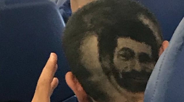 عيش المونديال| مشجع يرسم صورة محمد صلاح على رأسه